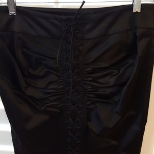 Black pencil skirt with lace up back detailing